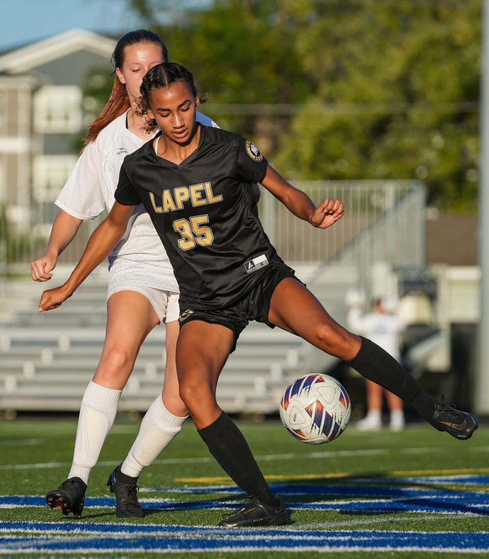 Lapel Bulldogs Krystin Davis (35) kicks the ball Tuesday, Oct. 3, 2023, during the IHSAA sectional semifinals at Heritage Christian High School in Indianapolis. The Lapel Bulldogs defeated the Scecina Crusaders, 6-2.