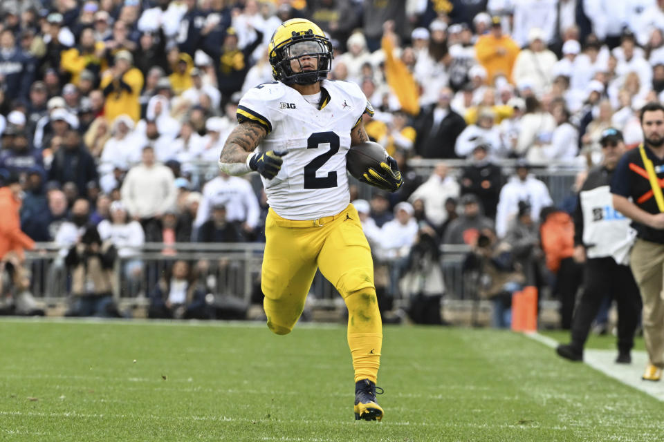 Michigan running back Blake Corum (2) led the way in a win over Penn State on Saturday, Nov.11, 2023, in State College, Pa. (AP Photo/Barry Reeger)