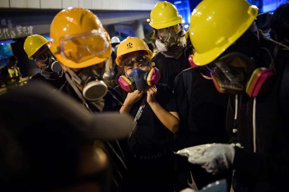 Demonstrators seen during a protest action in front of a government building in the Central district of Hong Kong, on Aug. 18, 2019. | Gregor Fischer/picture alliance via Getty Images)