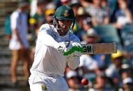 Cricket - Australia v South Africa - First Test cricket match - WACA Ground, Perth, Australia - 3/11/16 South Africa's Quinton de Kock hits a boundary from the bowling of Australia's Mitchell Starc. REUTERS/David Gray