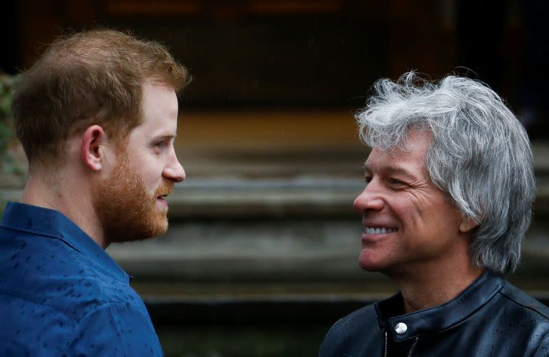 Britain's Prince Harry meets Jon Bon Jovi and members of the Invictus Games Choir in London