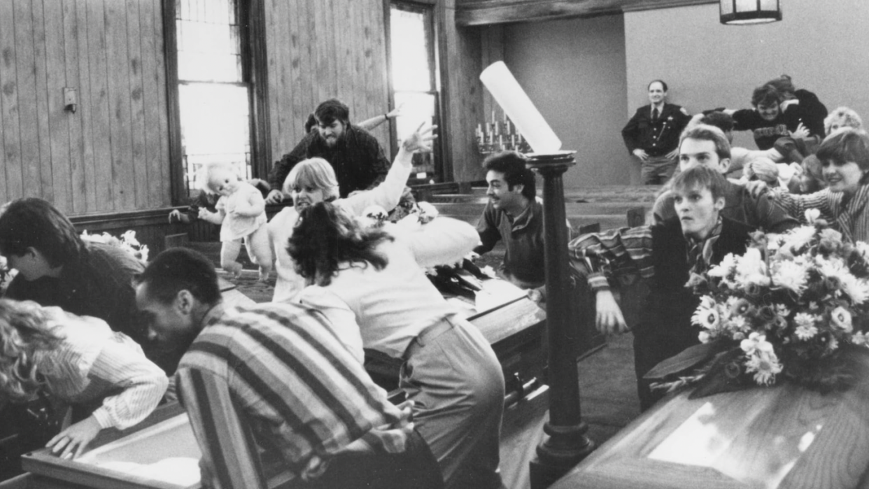 a group of people sitting in a room