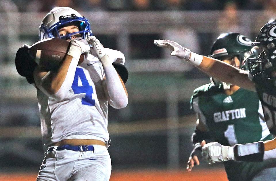 Sailor receiver Sam Allard catches a long bass from Belsan to break into the end zone.

The Scituate Sailors defeated the Grafton Gators to advance to the MIAA Division 4 state championship on Friday Nov. 17, 2023