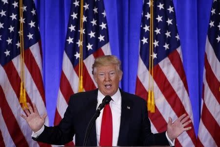 U.S. President-elect Donald Trump speaks during a news conference in the lobby of Trump Tower in Manhattan, New York City, U.S., January 11, 2017. REUTERS/Lucas Jackson/File Photo