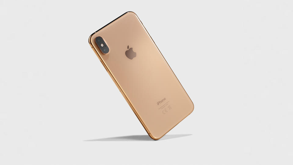 Editorial Use onlyMandatory Credit: Photo by Neil Godwin/Future/Shutterstock (10230403t)An Apple iPhone Xs Max Smartphone With A Gold FinishPremium Two-In-One Laptop Computers - 5 Oct 2018.