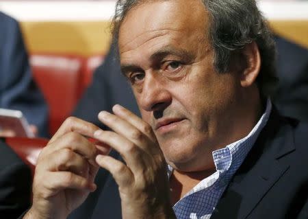 UEFA President Michel Platini waits for the draw of the Champions League semi-finals matches at the UEFA headquarters in Nyon, Switzerland, April 24, 2015. REUTERS/Denis Balibouse/Files