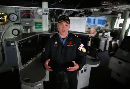 Commander Blair Saltel, the captain of the Royal Canadian Navy's Halifax-class frigate HMCS Calgary (FFH335) speaks during an interview with Reuters at the U.S. naval base in Yokosuka, Japan November 7, 2018. REUTERS/Issei Kato