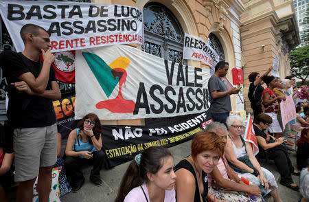 Demonstrators protest against Brazilian mining company Vale SA in Belo Horizonte, Brazil January 31, 2019. The banner reads; "Vale murderers." REUTERS/Washington Alves