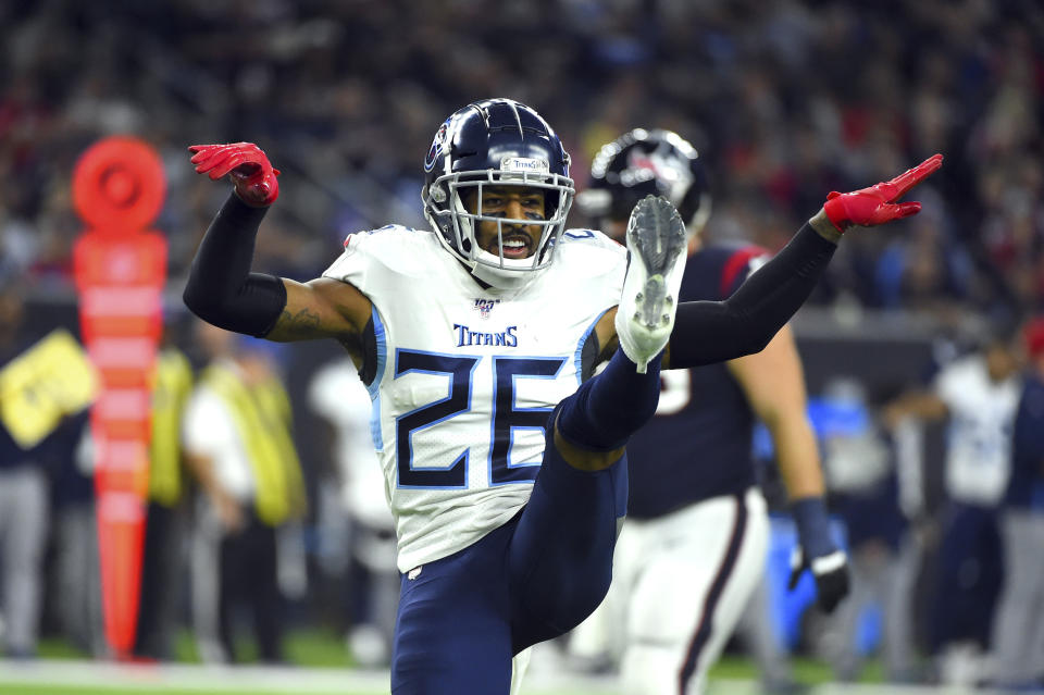 Tennessee Titans cornerback Logan Ryan (26) celebrates after sacking Houston Texans quarterback AJ McCarron during the second half of an NFL football game Sunday, Dec. 29, 2019, in Houston. (AP Photo/Eric Christian Smith)