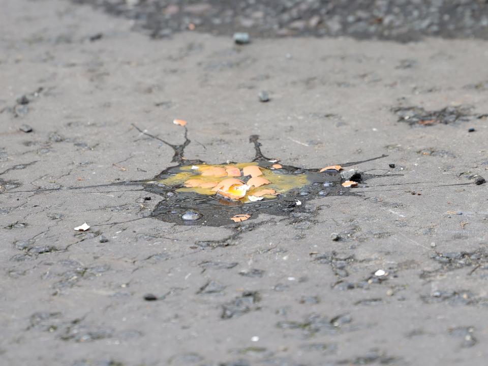 Eggs were spattered on the ground close to where Charles and Camilla walked in York.