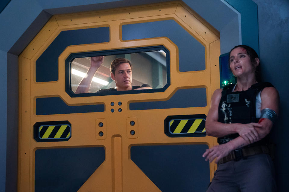 Luke Bracey and Elsa Pataky in 'Interceptor. ”  - Credit: Brook Rushton / Netflix
