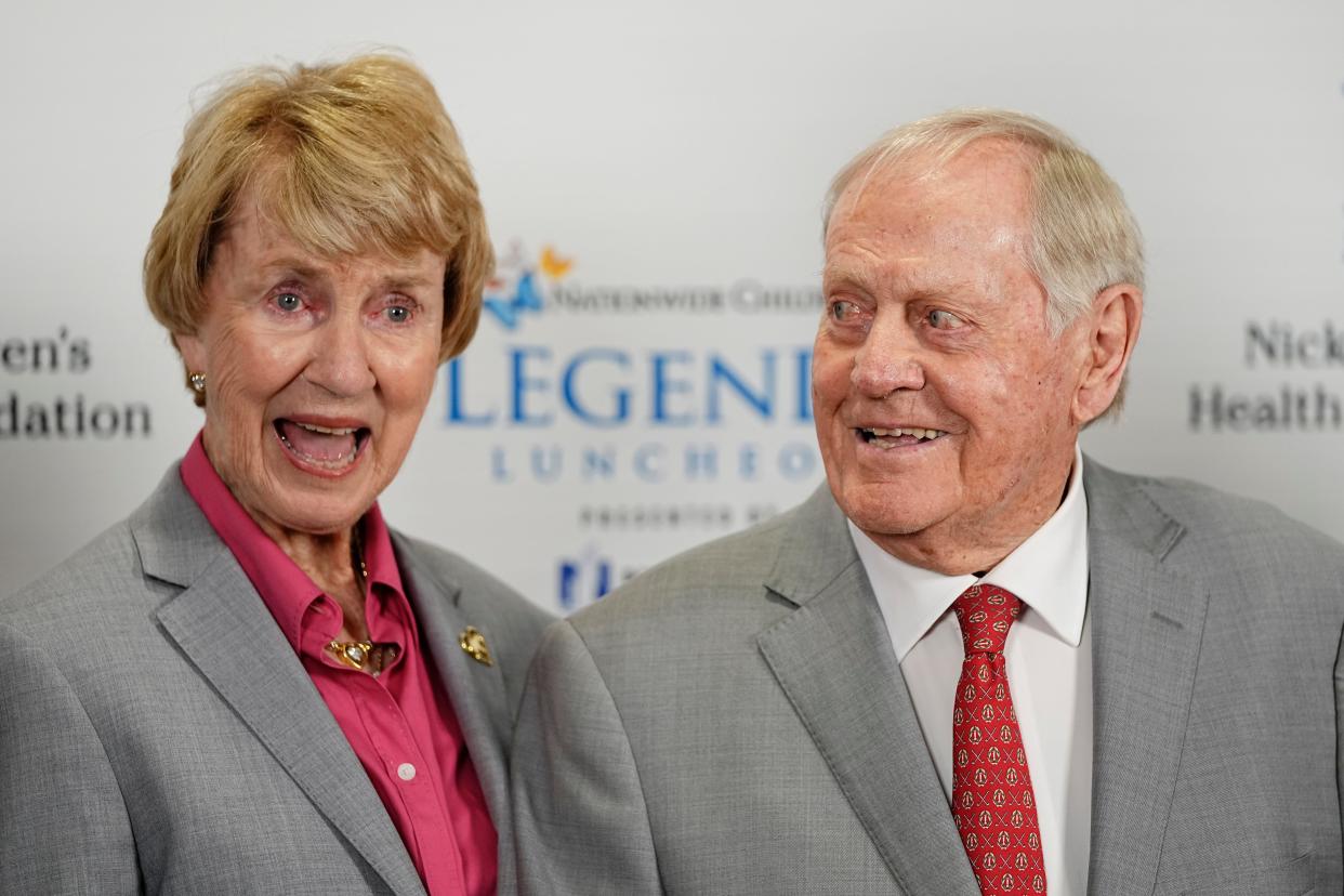 Jack and Barbara Nicklaus joke around while taking photos following Wednesday's Memorial Tournament Legends Luncheon at the Ohio Union.