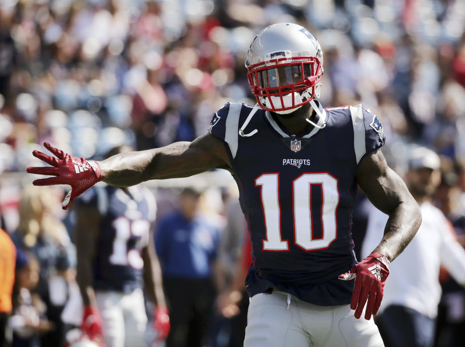 New England Patriots wide receiver Josh Gordon warms up before an NFL football game against the Miami Dolphins, Sunday, Sept. 30, 2018, in Foxborough, Mass. (AP Photo/Elise Amendola)