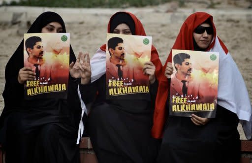 Bahrain demonstrators call for the release of jailed activist Abdulhadi al-Khawaja in Bahrain in April. Khawaja, facing a life sentence on charges of seeking to overthrow Bahrain's Sunni rulers, will on Monday end a hunger strike that lasted 110 days, his lawyer said