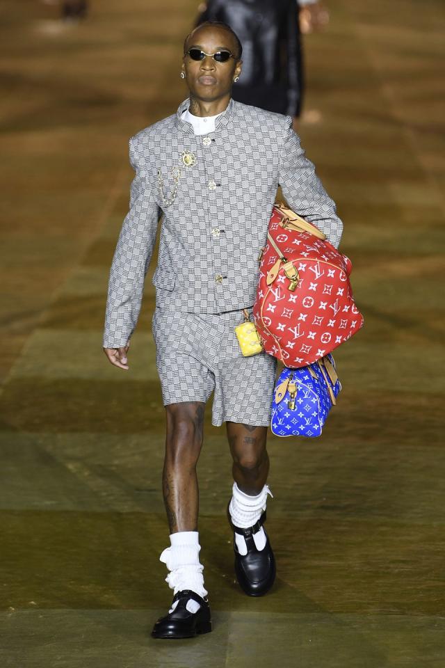 A black leather Louis Vuitton 'Alma' tote bag is seen during the News  Photo - Getty Images