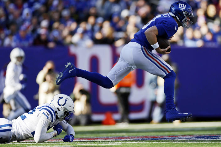 New York Giants quarterback Daniel Jones (8) runs with the ball during an NFL football game against the Indianapolis Colts, Sunday, Jan. 1, 2023, in East Rutherford, N.J. (AP Photo/Adam Hunger)