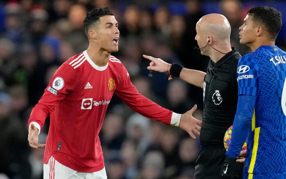 Cristiano Ronaldo started on the bench and managed to pick up a yellow card on a mixed day for the Manchester United star - AP
