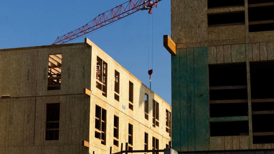 Construction crews have already built several floors of the Denton Street apartments.