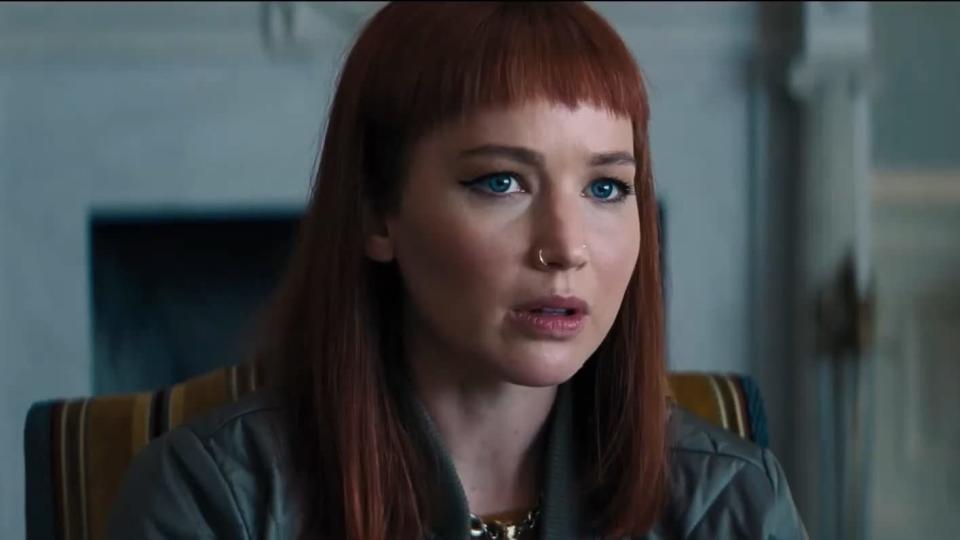 Photo of Jennifer Lawrence with red hair and baby bangs and a nose ring in Don't Look Up
