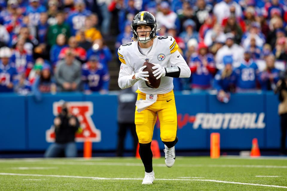 Pittsburgh Steelers quarterback Kenny Pickett (8) scrambles during an NFL football game, Sunday, Oct. 9, 2022, in Orchard Park, NY. (AP Photo/Matt Durisko)