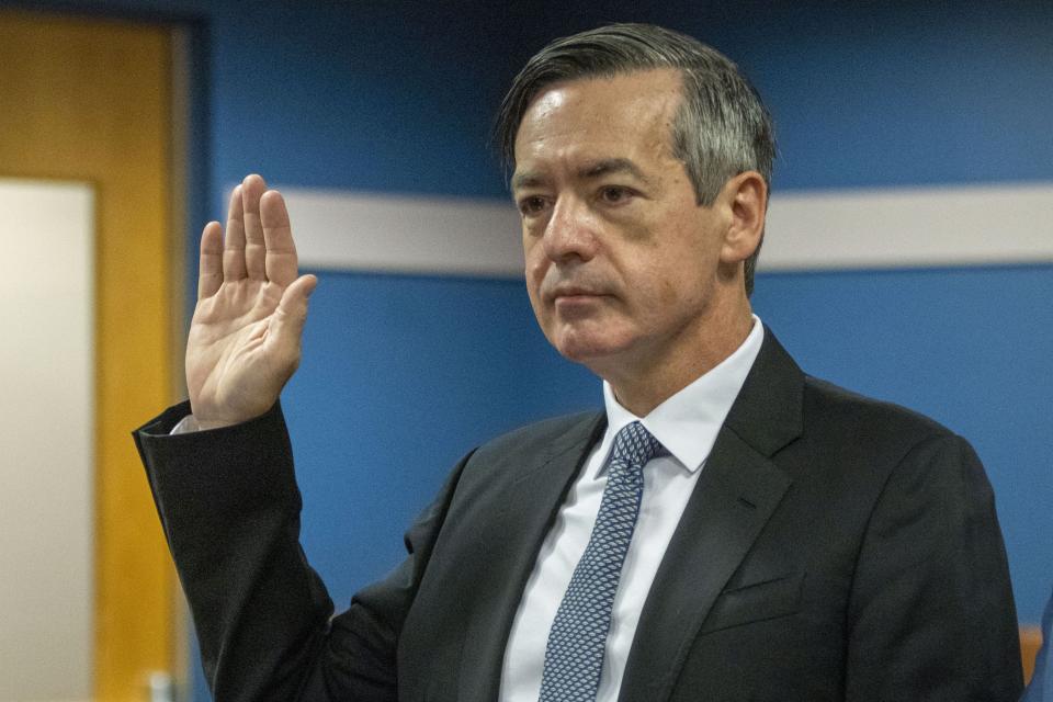 Lawyer Kenneth Chesebro is sworn in during a plea deal hearing, Friday, Oct. 20, 2023, at the Fulton County Courthouse in Atlanta. Chesebro, who was was charged alongside former President Donald Trump and 17 others with violating the state's anti-racketeering law in efforts to overturn Trump's loss in the 2020 election in Georgia, pleaded guilty to a felony just as jury selection was getting underway in his trial. (Alyssa Pointer/Pool Photo via AP)