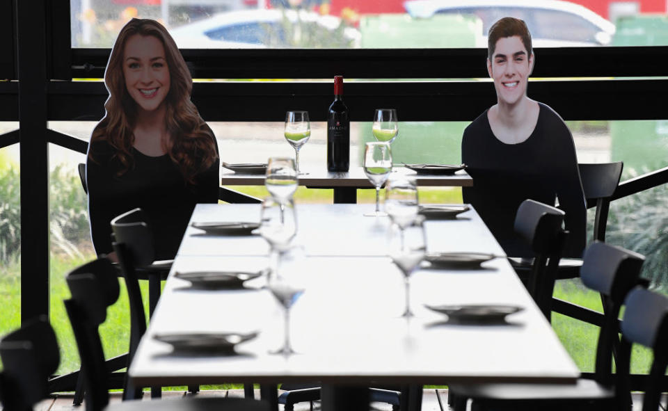 A pair of '2D patrons' at Five Dock Dining in Sydney, Australia. Getty Images