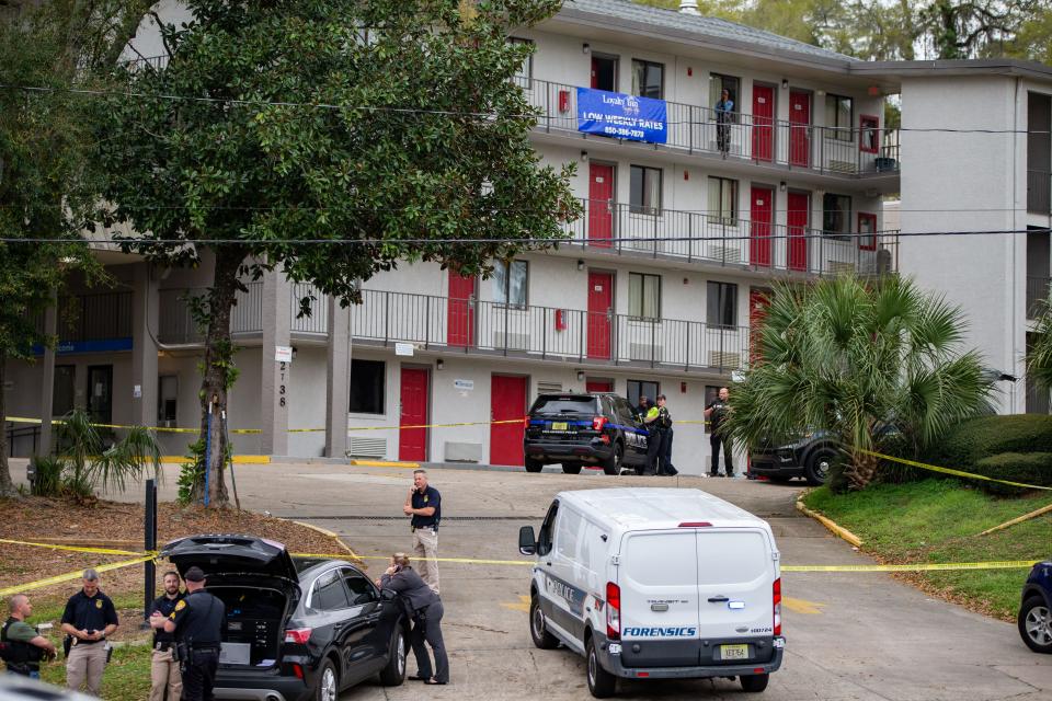 Tallahassee Police officers work the scene of a shooting that occurred on North Monroe Street on Friday afternoon, March 8, 2024.