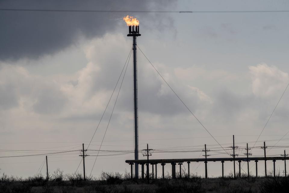 Natural gas flares at a wellhead in Hobbs, New Mexico, in March 2024.