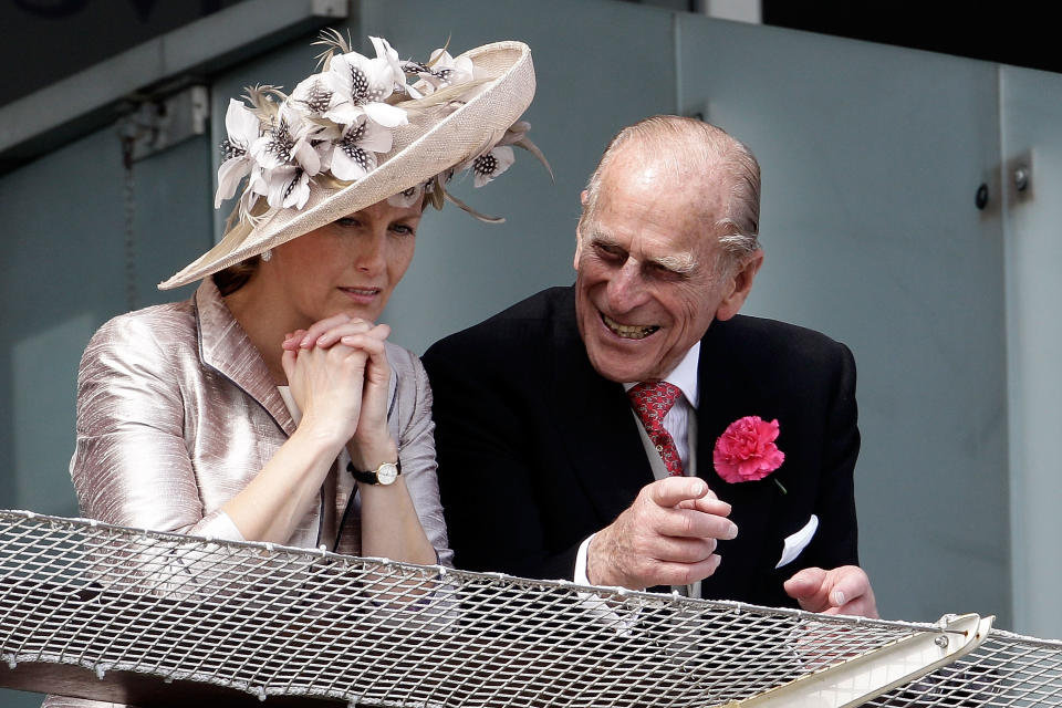 EPSOM, ENGLAND - JUNE 04: Prince Philip, Duke of Edinburgh and Sophie Rhys-Jones, Countess of Wessex wait for the start of the Epsom Derby at Epsom Downs racecourse on June 4, 2011 in Epsom, England. Carlton Hall had been the Bookmakers favourite to win the Derby, but came in third place, with Pour Moi winning. (Photo by Matthew Lloyd/Getty Images)