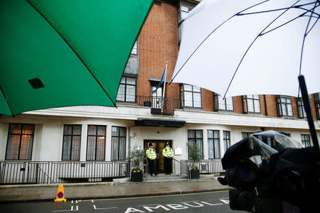 Police officers stand outside the King Edward VII's Hospital where Britain's Prince Philip recently underwent hip replacement surgery, in central London, Britain April 8, 2018. REUTERS/Henry Nicholls