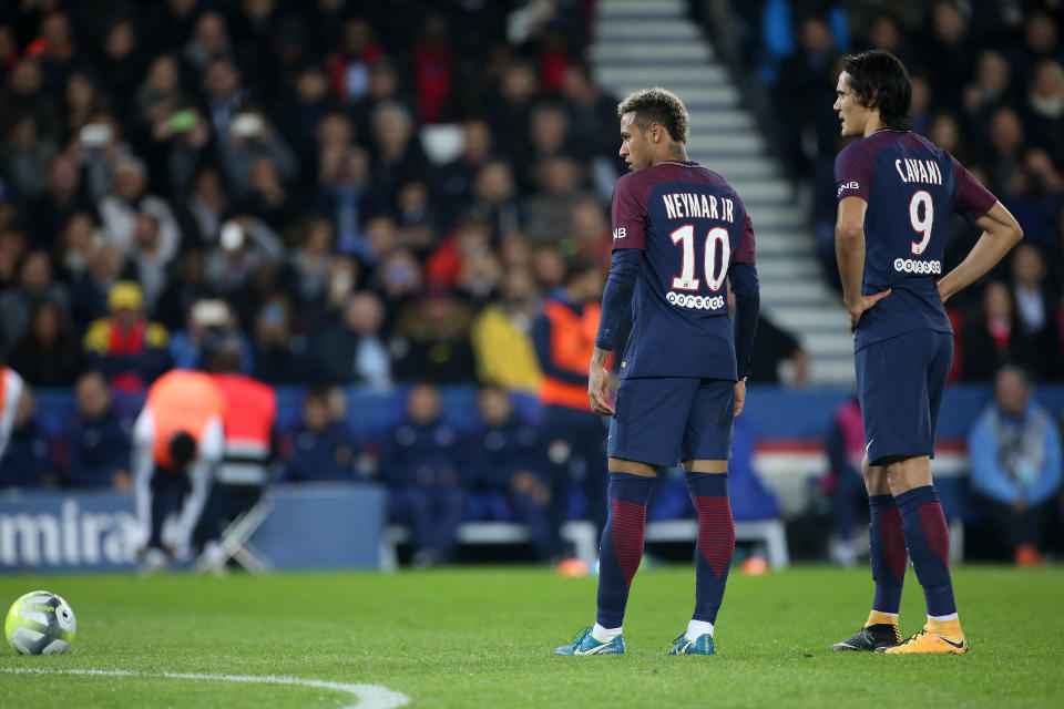 Before they fought over a penalty, Neymar and Edinson Cavani began their petty feud over a free kick. (Getty)