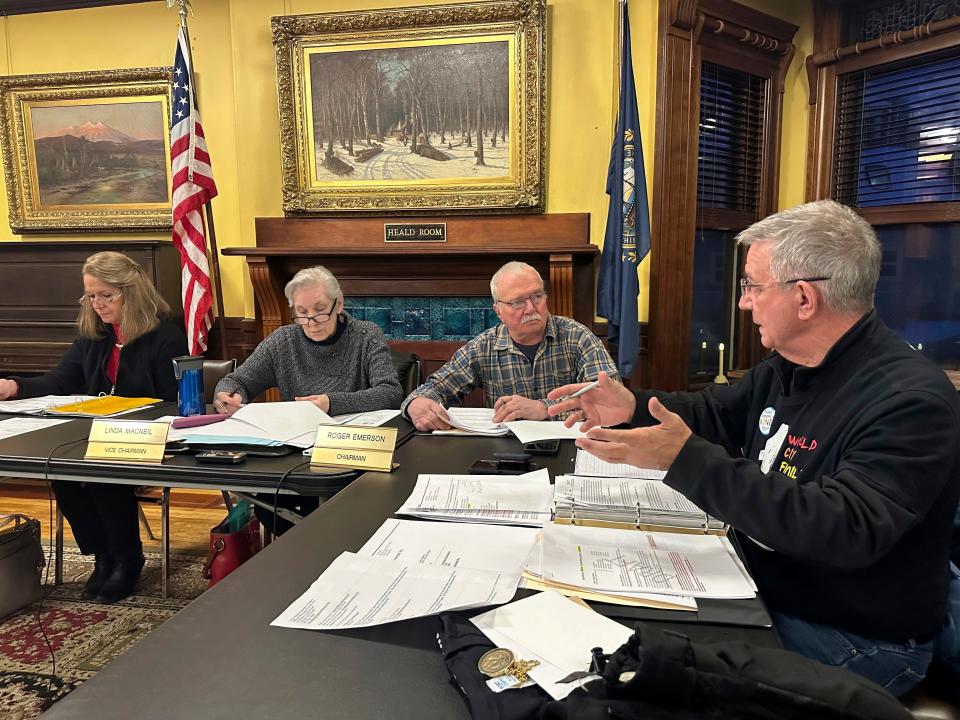 Littleton town manager Jim Gleason, right, talks to the town's selectmen during a meeting on Jan. 22, 2024, in Littleton, N.H. Gleason, whose late son was gay, resigned effective Friday, Feb. 2, 2024, to take a stand against the anti-LGBTQ sentiments being expressed by some people in Littleton.