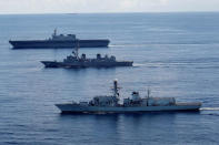 British frigate HMS Argyle (front), Japanese destroyer Inazuma (C) and Japanese helicopter carrier Kaga take part in a joint naval drill in the Indian Ocean, September 26, 2018. Picture taken September 26, 2018. REUTERS/Kim Kyung-Hoon