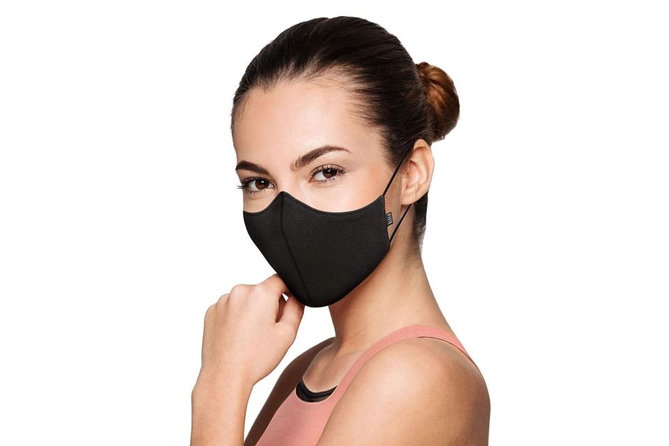 Woman wearing black cloth face mask