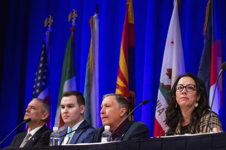 Becky Mitchell, Colorado's representative to the Upper Colorado River Commission, far right, speaks on a panel with representatives from the Lower Basin states during the Colorado River Water Users Association conference in Las Vegas, Dec. 14, 2023. The seven U.S. states that draw water from the Colorado River basin are suggesting new ways to determine how the increasingly scarce resource is divvied up when the river can't provide what it historically promised. (AP Photo/Ty ONeil)
