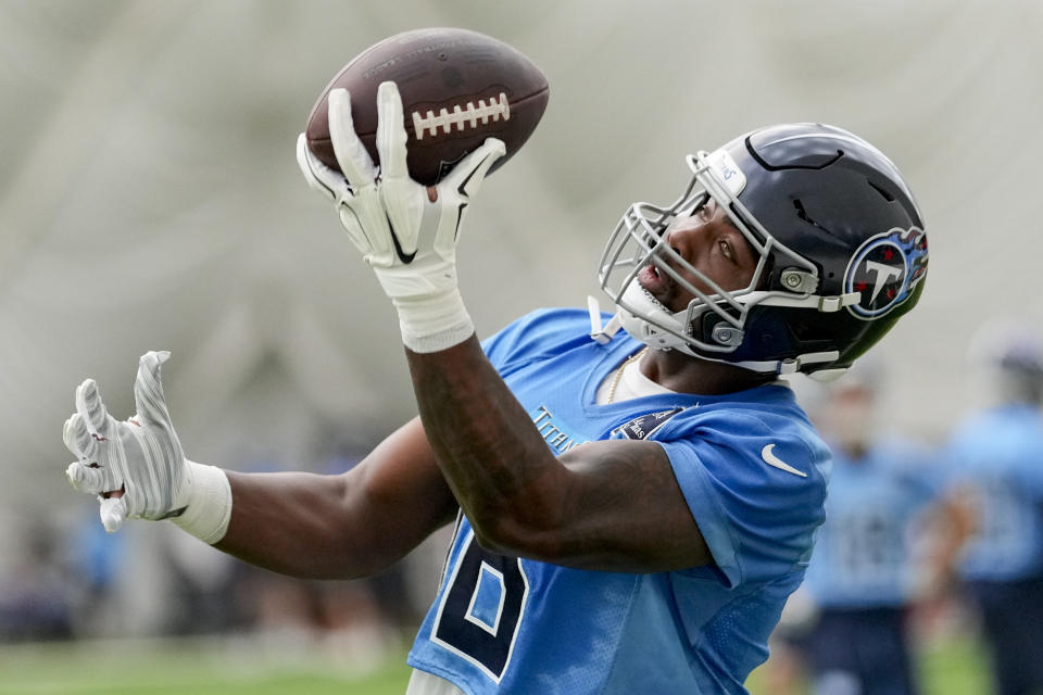 Tennessee Titans wide receiver Treylon Burks makes a catch during NFL football practice Tuesday, June 4, 2024, in Nashville, Tenn. (AP Photo/George Walker IV)