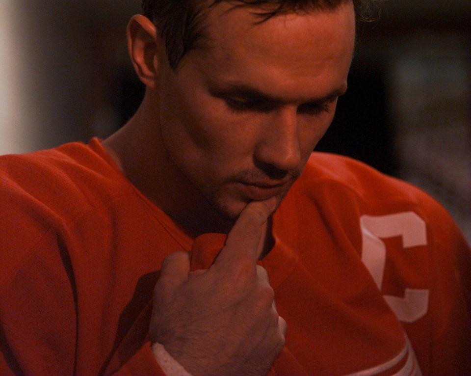 Detroit Red Wings captain Steve Yzerman thinks before answering a reporter's question after practice at McNichols Sports Arena in Denver, a day before Game 2 of the Western Conference finals, May 16, 1997.