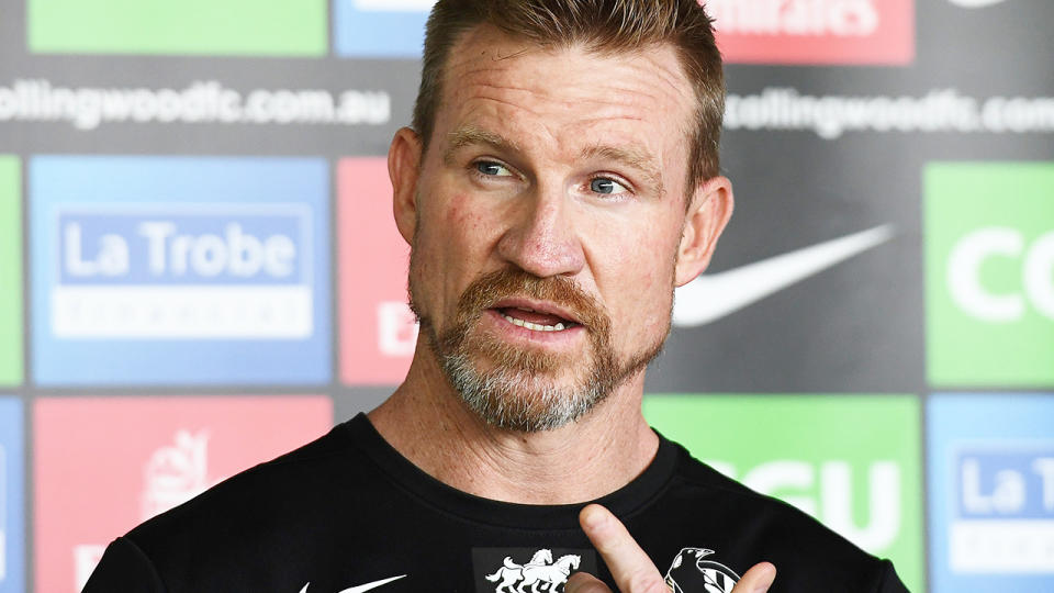 Nathan Buckley talks to the media at Collingwood training. (Photo by Quinn Rooney/Getty Images)