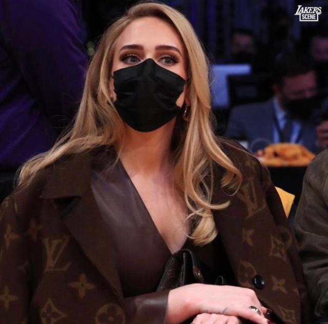 Adele goes glam in Louis Vuitton at NBA game with Rich Paul