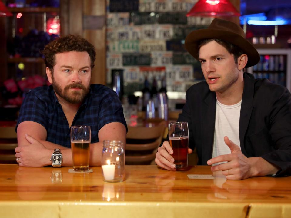 Danny Masterson and Ashton Kutcher at an event for "The Ranch" in June 2017.