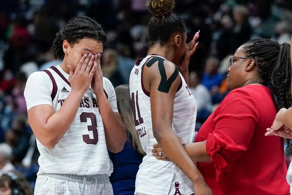 Texas A&M's Destiny Pitts (3) wipes her eyes as she leaves the game during a loss to Vanderbilt in an NCAA college basketball game at the women's Southeastern Conference tournament Wednesday, March 2, 2022, in Nashville, Tenn. (AP Photo/Mark Humphrey)