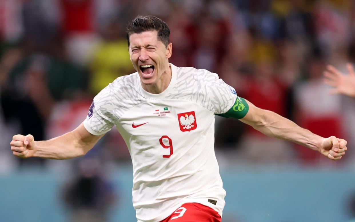 Robert Lewandowski of Poland celebrates after scoring their team's second goal during the FIFA World Cup Qatar 2022 Group C match between Poland and Saudi Arabia - Hector Vivas/Getty