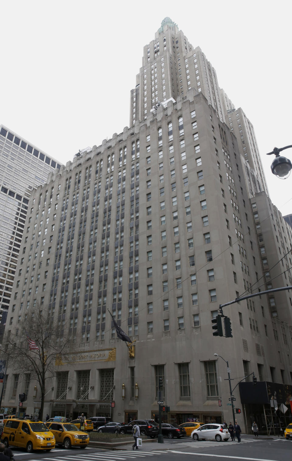 The Waldorf Astoria hotel is shown, Tuesday, Feb. 28, 2017, in New York. The hotel, purchased by the Anbang Insurance Group, a Chinese company, is closing Wednesday for two to three years for renovation. Exact details of the renovation haven't been released, but its conversion into a hybrid of private residences and a smaller hotel follows a model set by another landmark New York City hotel, The Plaza. The exterior is protected by law as a New York City landmark, but some fans are still nervous about the future. (AP Photo/Kathy Willens)