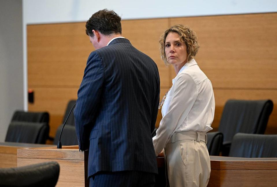 Kristen Watts looks towards Trooper Toni Schuck in the Manatee County Judicial Center after Judge Teri Dees sentenced her to 10 years in prison with credit for time served and four years of probation on April 2, 2024. Watts pleaded guilty to driving under the influence and fleeing and eluding law enforcement on the after she bypassed a I 275 closure and crashed into Trooper Schuck while a 10k was underway on the Skyway Bridge.