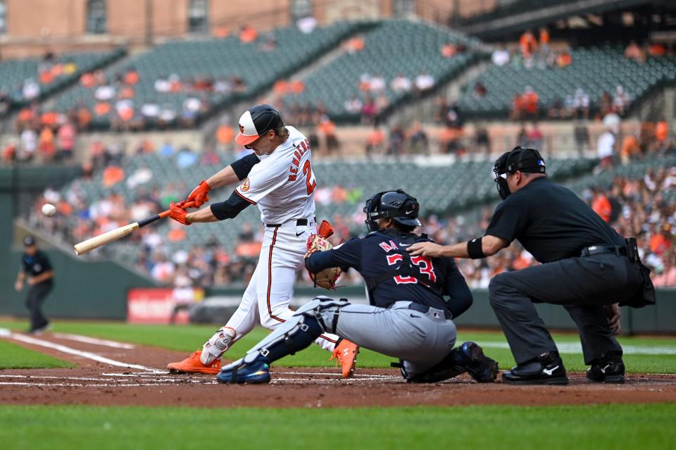 Orioles shortstop Gunnar Henderson hits a two-run home run against the Guardians in the first inning, June 25, 2024, in Baltimore.