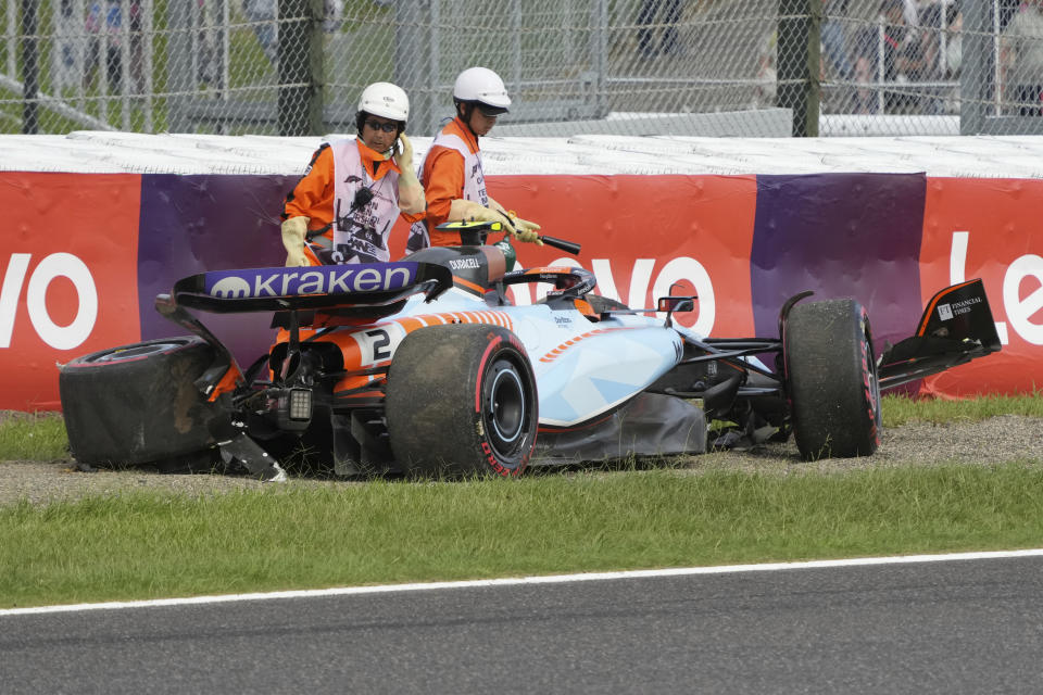 The car of Williams driver Logan Sargeant of the US is off the track after a crash during qualifying session for the Japanese Formula One Grand Prix at the Suzuka Circuit, Suzuka, central Japan, Saturday, Sept. 23, 2023. (AP Photo/Toru Hanai)