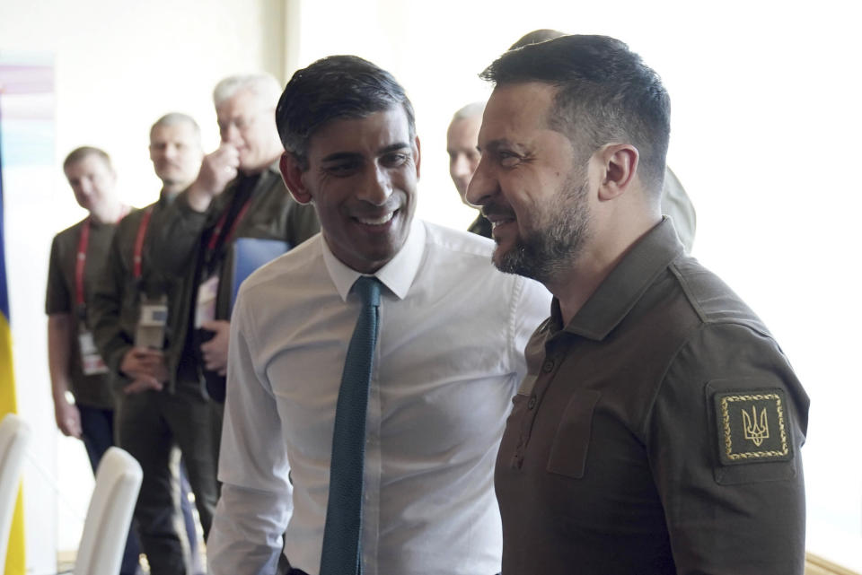 Britain's Prime Minister Rishi Sunak, left, and Ukraine President Volodymyr Zelenskyy meet at the Grand Prince Hotel, during the G7 Summit in Hiroshima, Japan, Saturday, May 20, 2023. (Stefan Rousseau/Pool via AP)