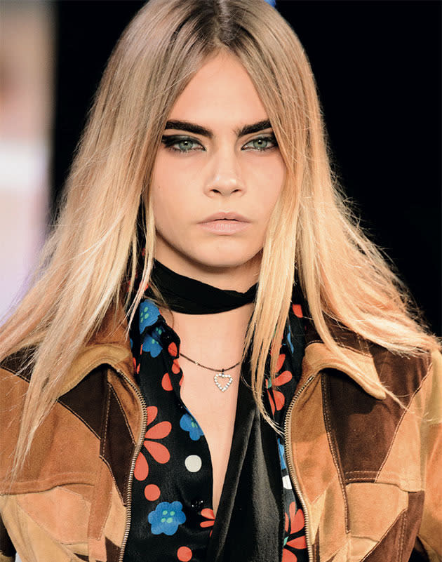 Blonde hair Cara Delevingne.