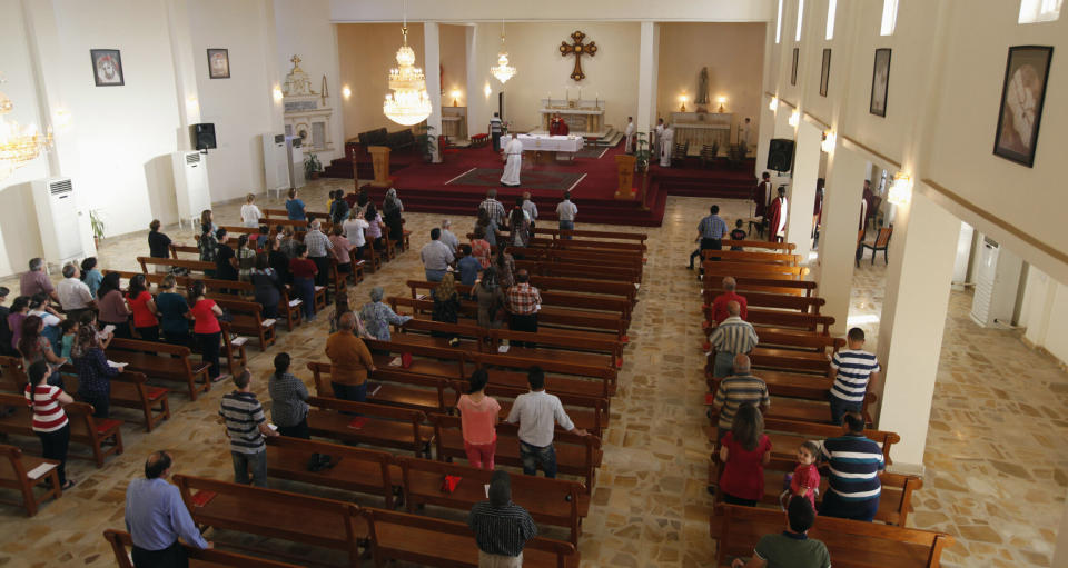 Iraqi Christians attend a mass at St. Joseph Chaldean Church in Baghdad on July 20, 2014. (Photo: Ahmed Saad / Reuters)