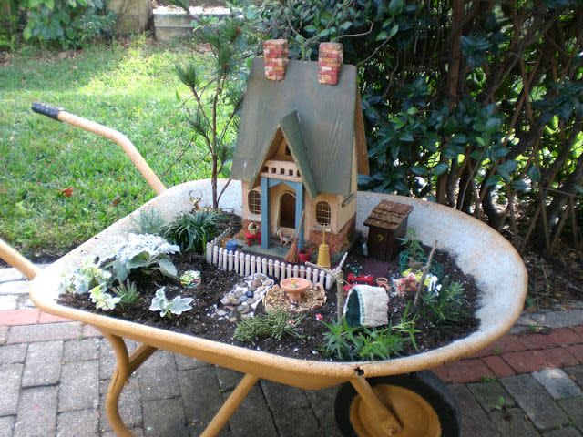 wheelbarrow fairy garden